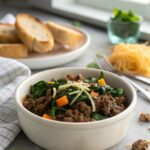 A delicious dish of low carb ground beef and spinach served hot.