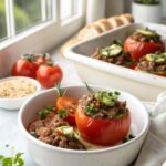 SEO-friendly alt text describing the featured image of tomatoes stuffed beef zucchini boats