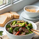 A delicious beef broccoli stir-fry recipe plated and ready to serve.