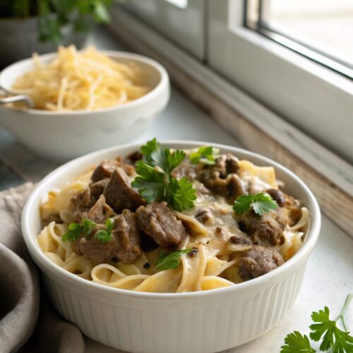 SEO-friendly alt text describing the featured image of Cheesy Beef Stroganoff Recipe