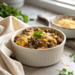 Appetizing close-up of a freshly baked cheesy hamburger rice casserole