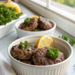 A delectable hamburger steak patties recipe served with gravy and sides