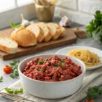 Featured image of a savory ground beef quick recipe served on a white plate
