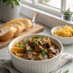 Mouth-watering photograph of completed old fashioned beef stroganoff recipe.