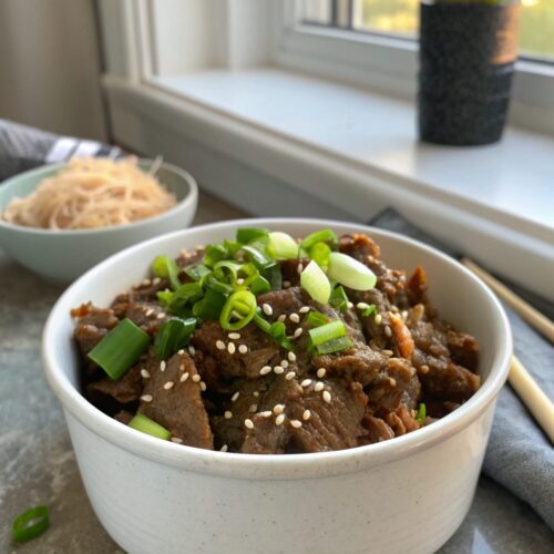 A beautifully plated dish of slow cooker Korean beef.