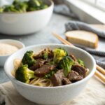 A beautiful shot of tender beef and broccoli served fresh.