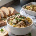 A beautiful plated chicken mushroom stroganoff dish garnished with parsley
