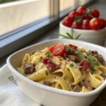A scrumptious bowl of Bacon Cheeseburger Alfredo Pasta ready to serve.