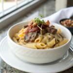 A delectable Bacon Cheeseburger Alfredo Pasta served with garnish
