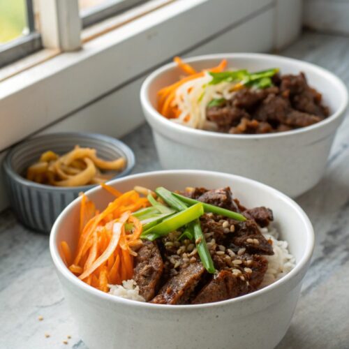 Close-up shot of a mouthwatering beef bulgogi bowl, garnished and ready to eat.