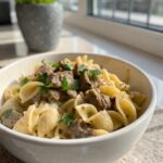 Delicious and creamy beef and shells served in a bowl.