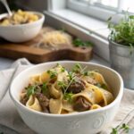 A delicious serving of creamy beef shells showcasing its rich and creamy appearance.