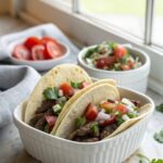 Featured image of crock pot carne asada tacos ready to serve