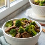 Featured image of a delicious Crockpot Beef Broccoli Recipe, vibrant in color and served elegantly
