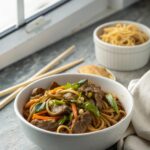 Final serving of Delectable Beef Lo Mein Recipe in a white bowl.