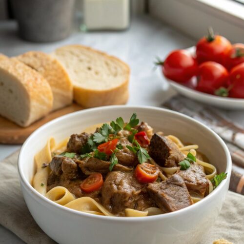 Beef Stroganoff with beef tips served beautifully in a bowl.