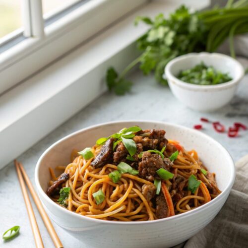 SEO-friendly alt text describing the featured image, including the sticky beef noodles recipe