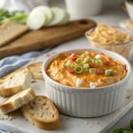 Bowl of savory Buffalo Chicken Dip with dippers
