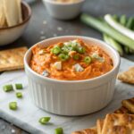 A stylish view of buffalo chicken dip ready to serve