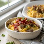 Featured image of the Bacon Cheeseburger Alfredo Pasta served in a white bowl.