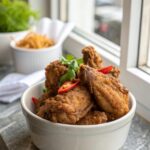 Featured image of extra crispy southern fried chicken wings, served in a bowl