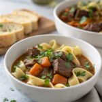Hearty beef stew egg noodles with tender beef and savory broth.